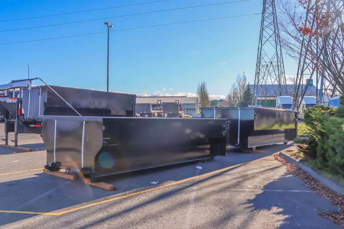 Roll-off dumpster ready for waste disposal at job site for 2 Yard Dumpster Rental in Mounds View